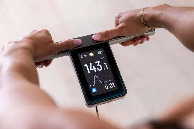 Wyze moved the screen on its new smart scale to the handle so it’s easier to read at eye level